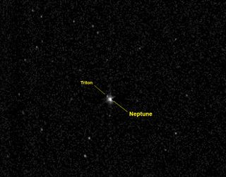 This labeled photo identifies the planet Neptune and its large moon Triton as they appeared to NASA's New Horizons spacecraft on July 10, 2014 from a distance of 2.45 billion miles (3.96 billion km). New Horizons is headed for a 2015 flyby of the dwarf planet Pluto. On Aug. 25, 2014, the probe passed the orbit of Neptune.