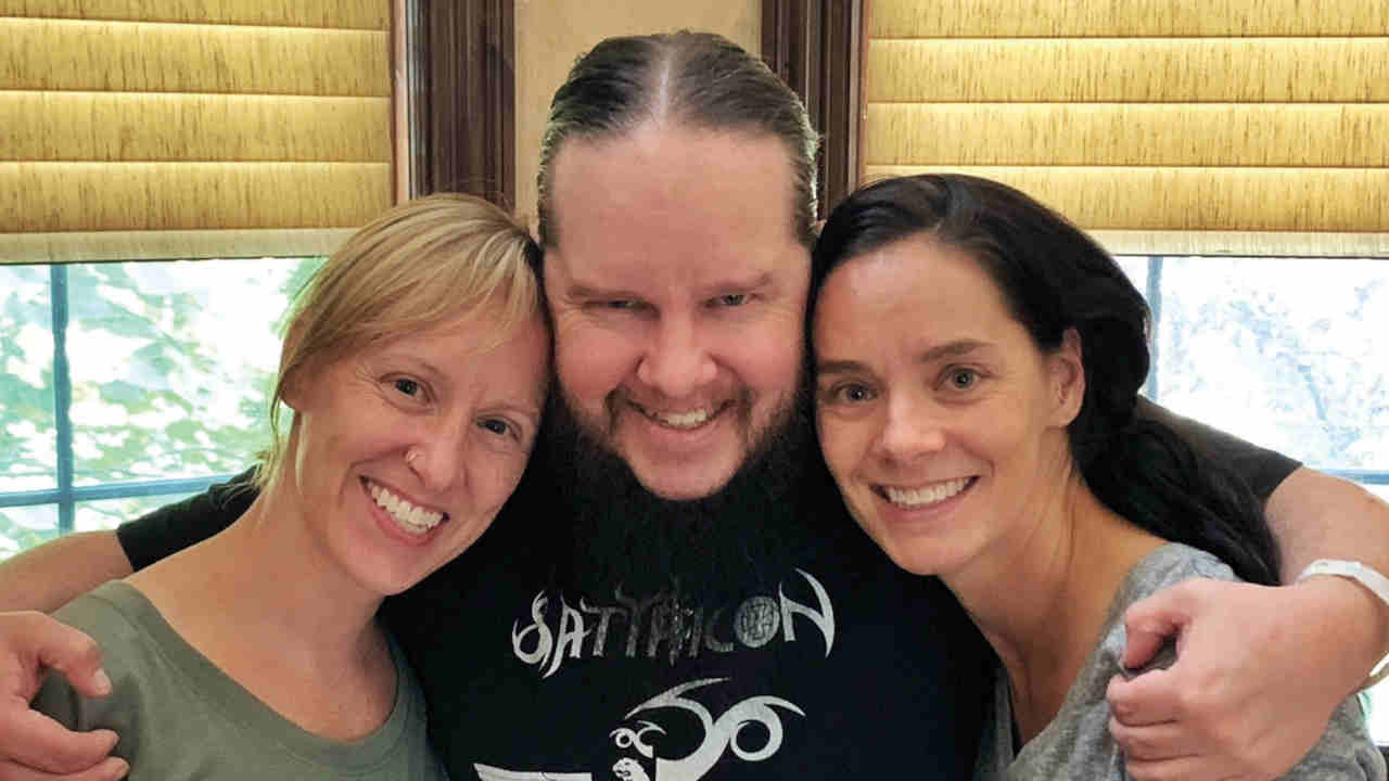 Joe Jordison with his sister Annie and Katie