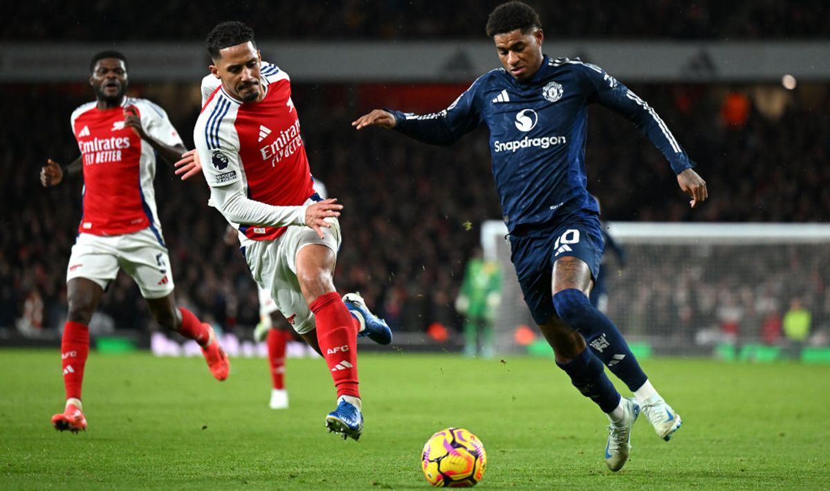 Marcus Rashford of Manchester United is challenged by William Saliba of Arsenal