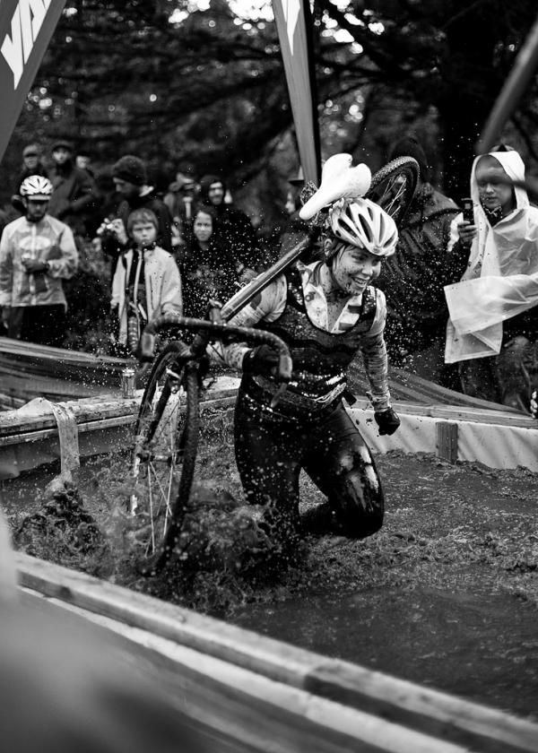 Competitors had to cross a muddy water filled trough