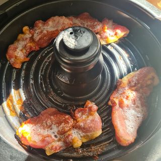 Cooked bacon inside of the Tefal Actifry Genius XL 2in1