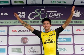 Primoz Roglic on the podium after winning stage 4 at Tour de Slovenie