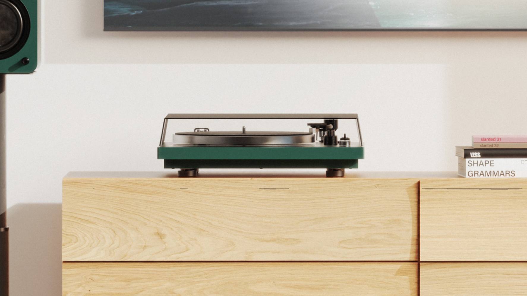 The Kanto Audio Obi3 Gen 2 model on a wooden drawer.