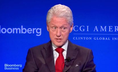 Bill Clinton says he won't make paid speeches if his wife is elected president