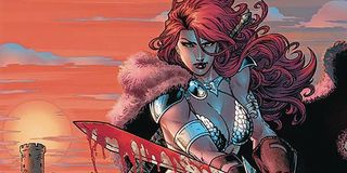 Red Sonja wielding a bloody sword