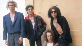 Jane’s Addiction posing for a photograph in 1990