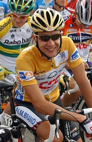 Carlos Sastre (CSC) smiling at the start