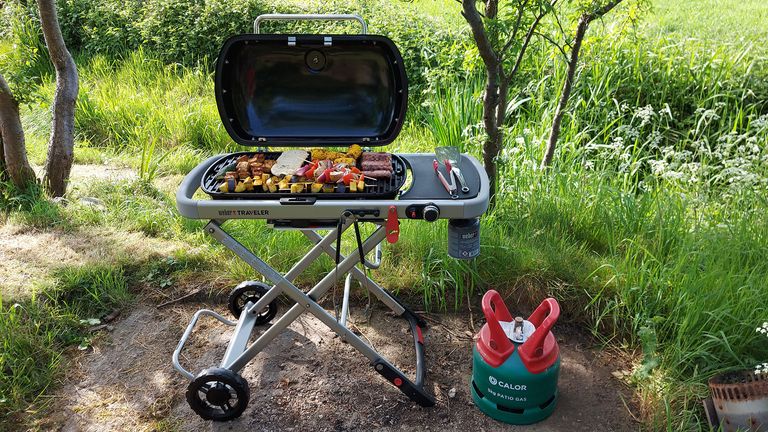 Weber Traveller barbecue in use