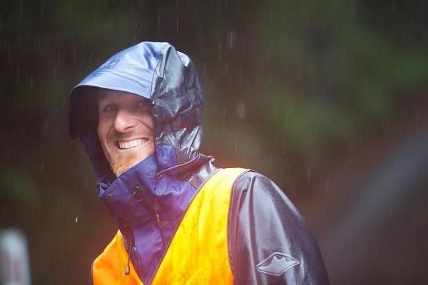 Wildside marshall Adrian McCulloch keeps smiling through heavy rain in Zeehan.