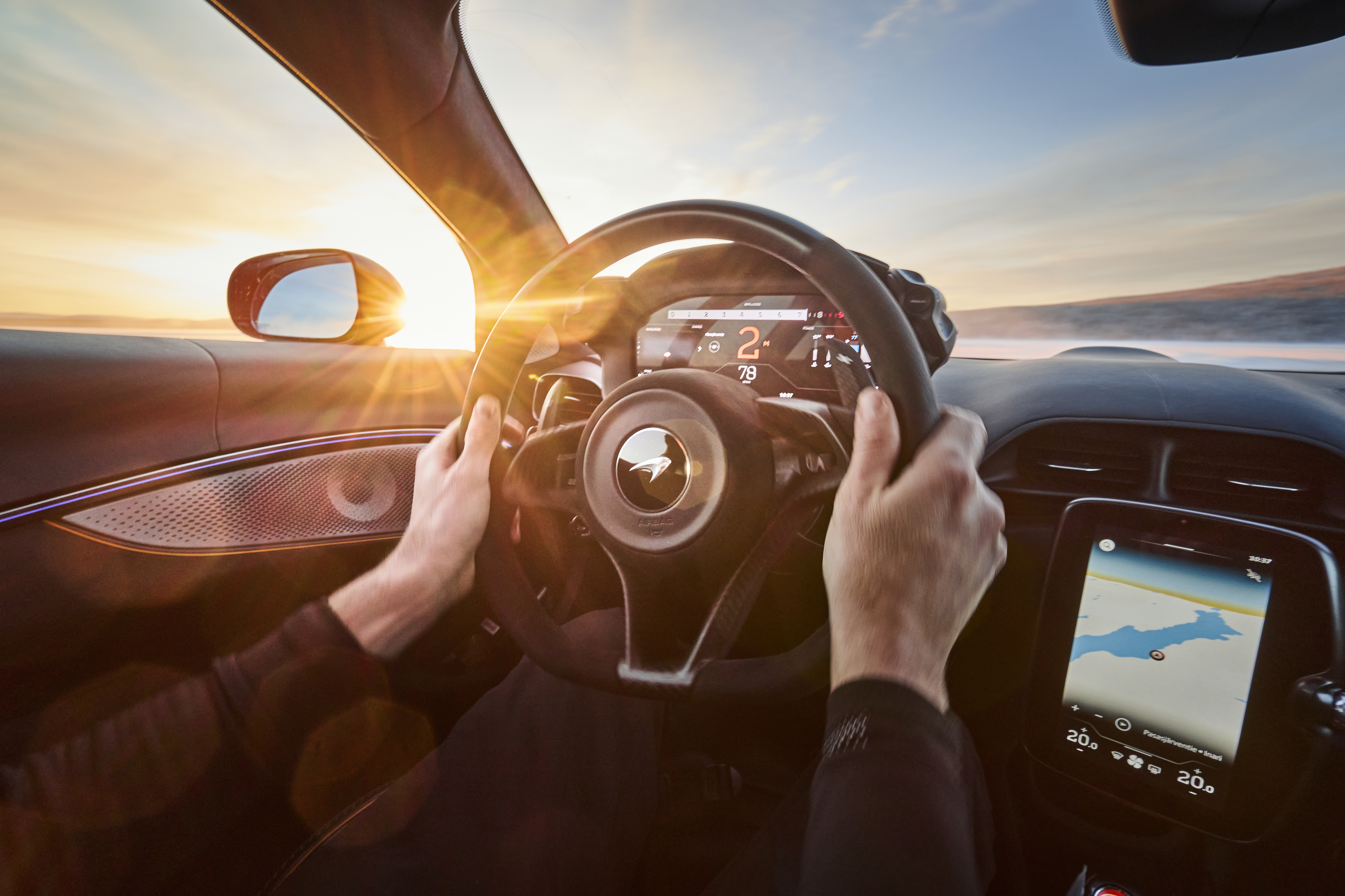 Images of a McLaren Artura going sideways on some ice