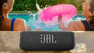 JBL Flip 6 by a pool