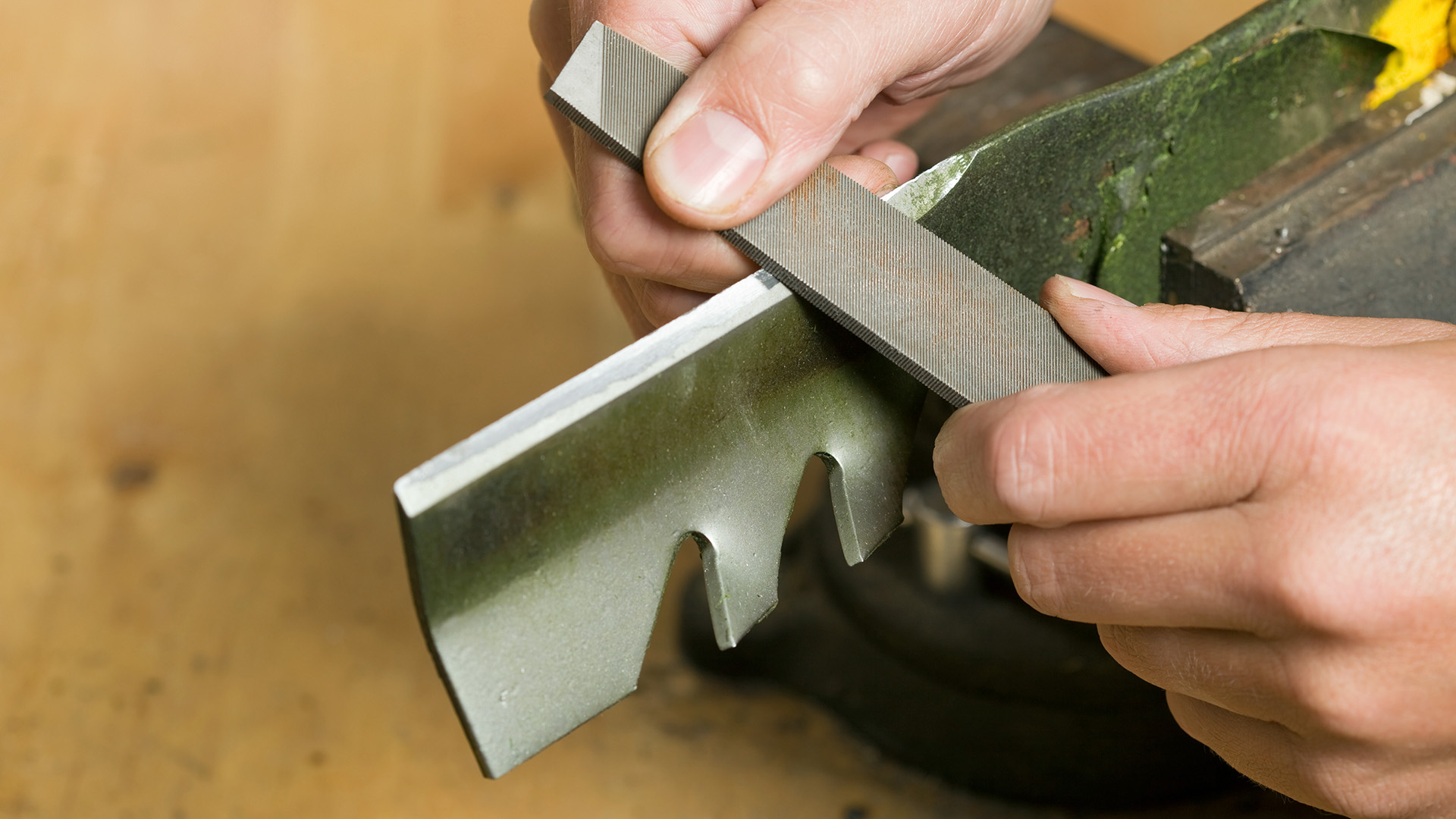 Try these tools to sharpen lawn mower blades