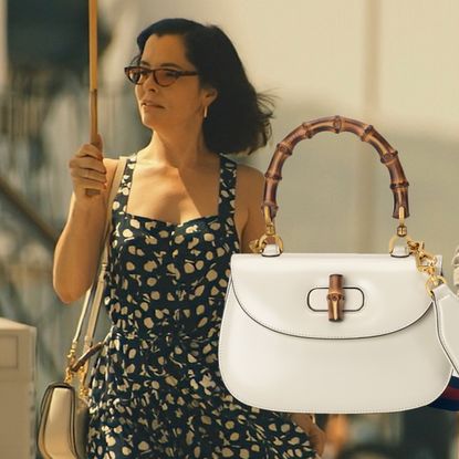 Parker Posey in character on the white lotus carrying a bamboo handle tote bag by Gucci to illustrate the series' attention to designer status items