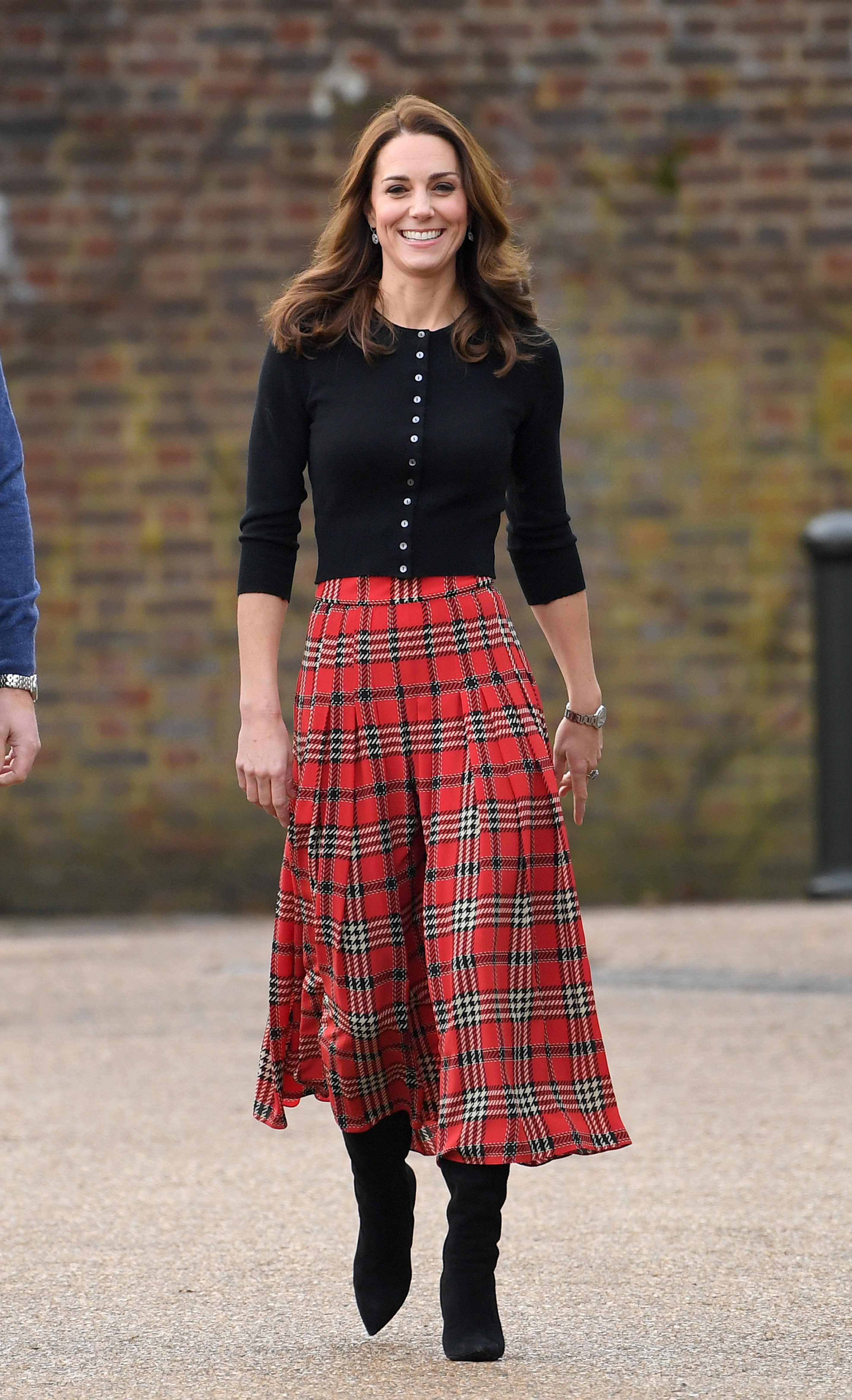 Kate Middleton wears a tartan maxi skirt