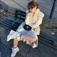 Influencer @izzipoopi wears the Isabel Marant wedge trainers. 