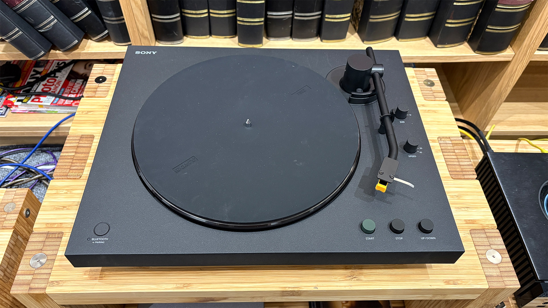 Sony PS-LX5BT Bluetooth turntable on wooden hi-fi rack