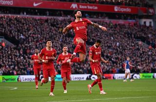 Dominik Szoboszlai of Liverpool celebrates scoring his team's first goal during the Premier League match between Liverpool FC and Ipswich Town FC at Anfield on January 25, 2025 in Liverpool, England. (