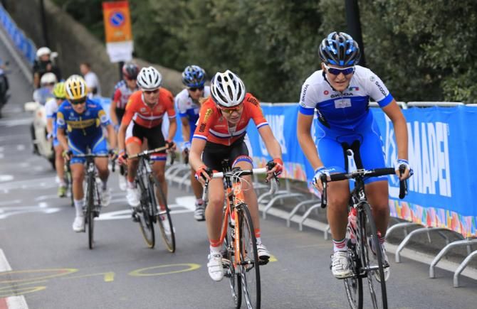Italy's Elisa Longo Borghini attacks the lead group and is marked by Anna van der Breggen (Netherlands)