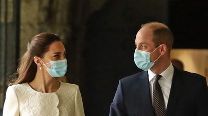 Britain's Prince William, Duke of Cambridge and Britain's Catherine, Duchess of Cambridge arrive for a visit to the coronavirus vaccination centre at Westminster Abbey, central London on March 23, 2021, to pay tribute to the efforts of those involved in the Covid-19 vaccine rollout. (Photo by Aaron Chown / POOL / AFP) (Photo by AARON CHOWN/POOL/AFP via Getty Images)