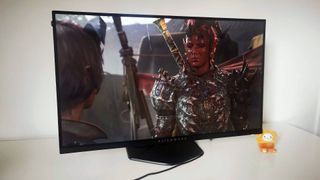 Alienware AW2724HF monitor with Karlach from Bladur's Gate 3 on screen