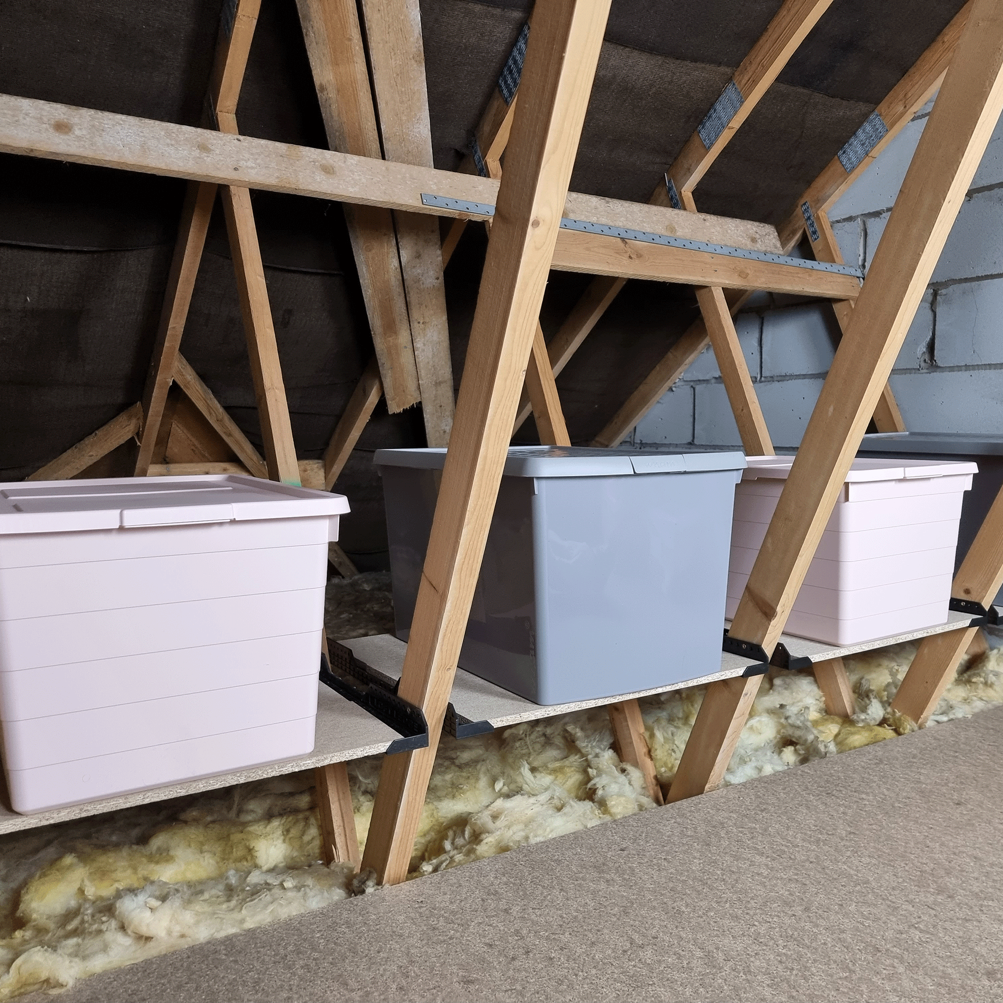 Loft with storage boxes stacked up