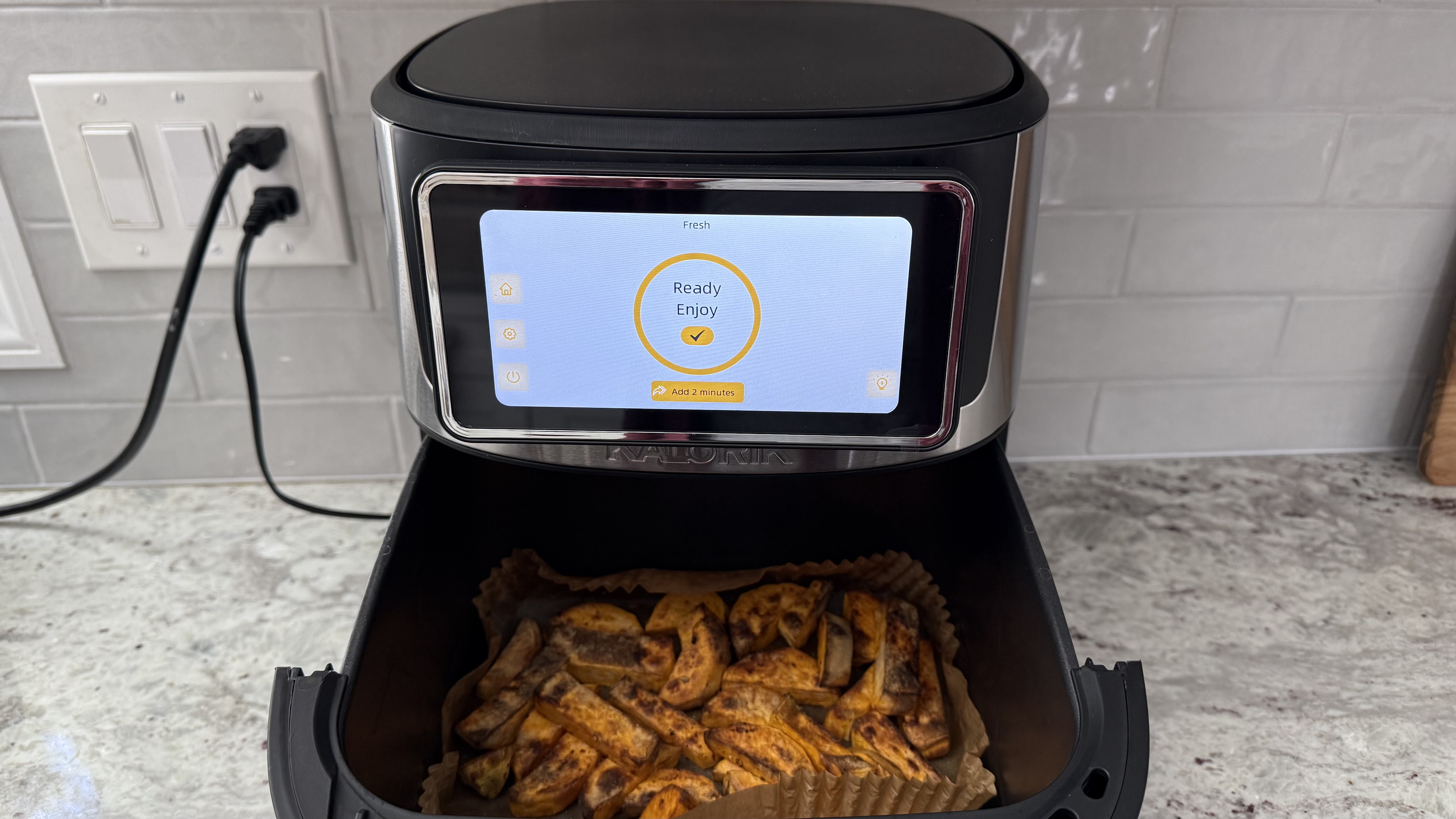 Variety of foods made while testing the Kalorik Vivid Touch air fryer