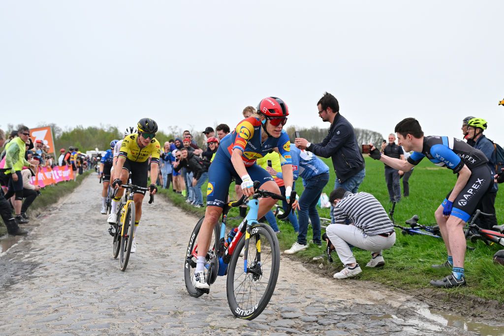 ROUBAIX FRANCE APRIL 06 LR Marianne Vos of The Netherlands and Team Visma Lease a Bike and Ellen van Dijk of The Netherlands and Team Lidl Trek passing through the Carrefour de lArbre cobblestones sector during the 4th ParisRoubaix Femmes 2024 a 1485km one day race from Denain to Roubaix on UCIWWT April 06 2024 in Roubaix France Photo by Luc ClaessenGetty Images