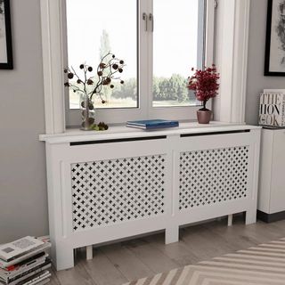 white decorative radiator cover forming window sill
