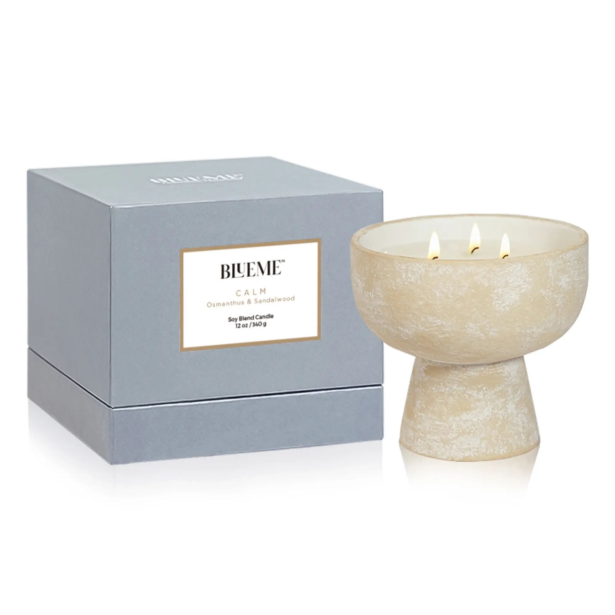 Candle in a rustic ceramic pot