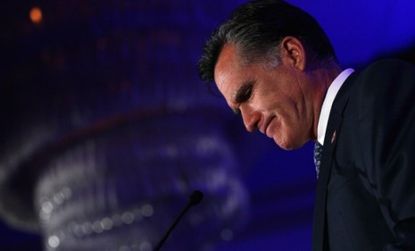 Presidential hopeful Mitt Romney said Friday that he believes humans are at least partially responsible for climate change, sparking outrage from critics on the Right.