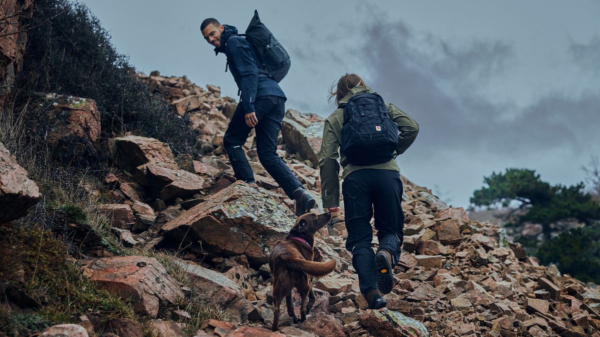 Man and woman wearing Fjällräven waterproof jackets