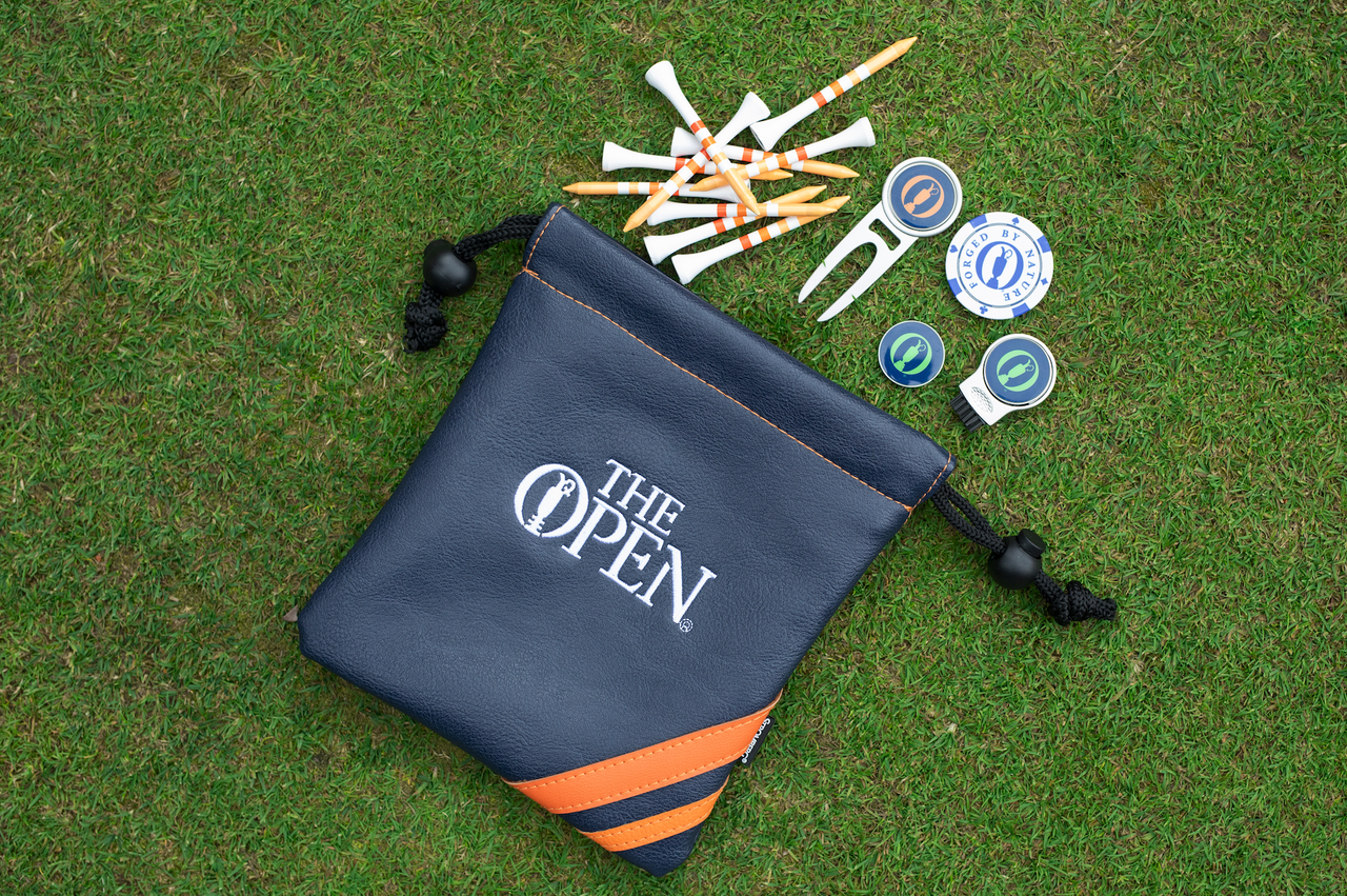 An Open Championship bag with tees and accessories