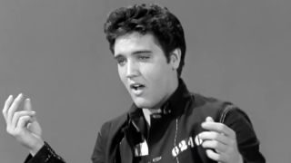 Elvis Presley performing Jailhouse Rock movie's title song.