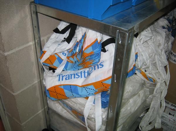 A stash of Garmin musette bags. Every available inch of storage space is used at the service course.