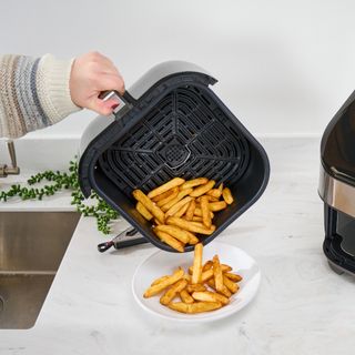 cooking chips with air fryer on countertop