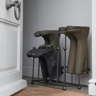 Boot rack in a doorway