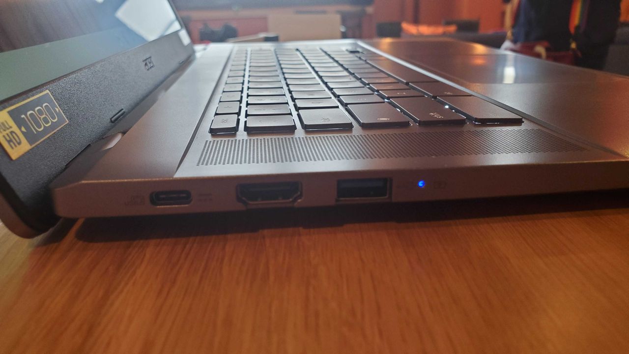 Chromebook Plus laptop on wooden table