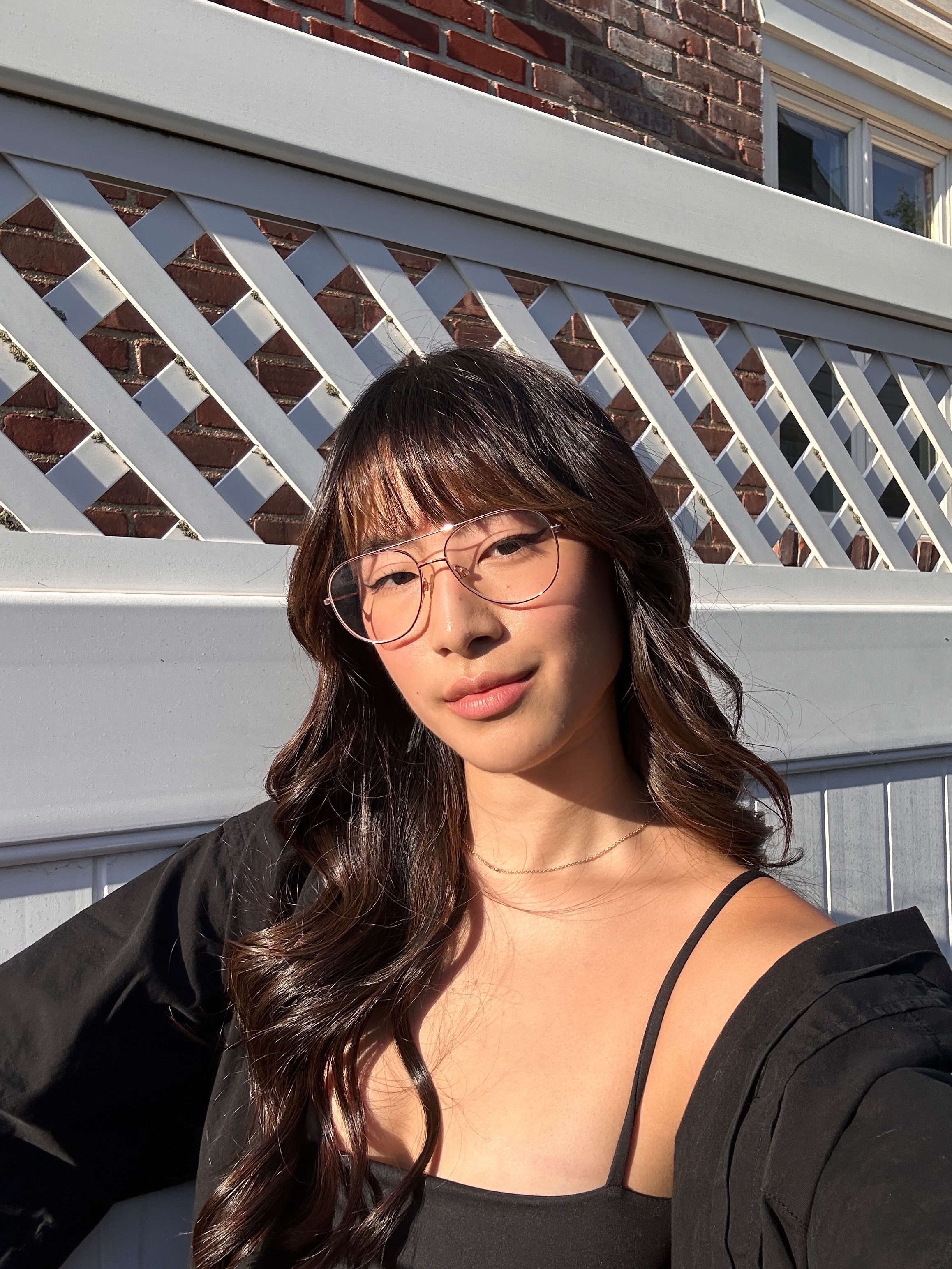 Kristina Ang taking a selfie of her new bangs.