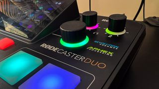 RODECaster Duo's adjusting knobs and logo branding up close