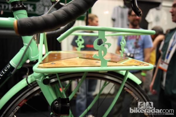 The ornate railing on Shamrock Cycles' city bike front rack should help keep boxes from falling over the edge.
