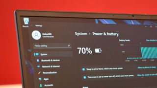 The Windows 11 battery monitor panel on an Acer Predator Helios 300 (2022).