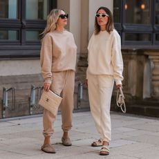 Women in beige tracksuits GettyImages-1417017221