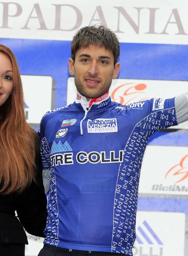 Enrico Rossi (Meridiana Kamen) in the blue leader's jersey.