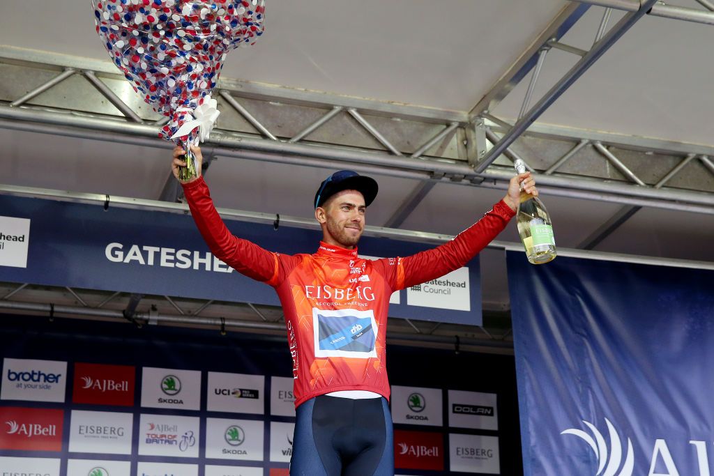 GATESHEAD ENGLAND SEPTEMBER 10 Jacob Scott of United Kingdom and Team Canyon DHB Sungod celebrates winning the red sprint jersey on the podium ceremony after the 17th Tour of Britain 2021 Stage 6 a 198km stage from Carlisle to Gateshead TourofBritain TourofBritain on September 10 2021 in Gateshead England Photo by Alex LiveseyGetty Images