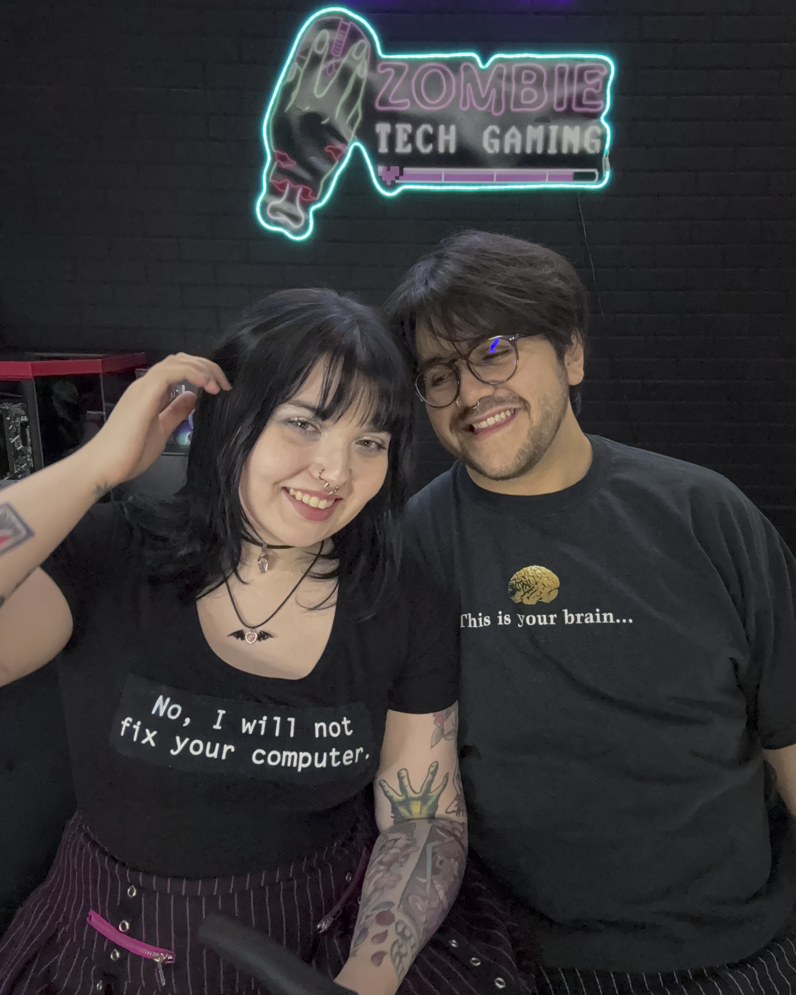 Zo&amp;euml; Baye and Brandon Ayala are seen in their garage work space. The pair form the prebuilt PC business Zombie Tech Gaming.