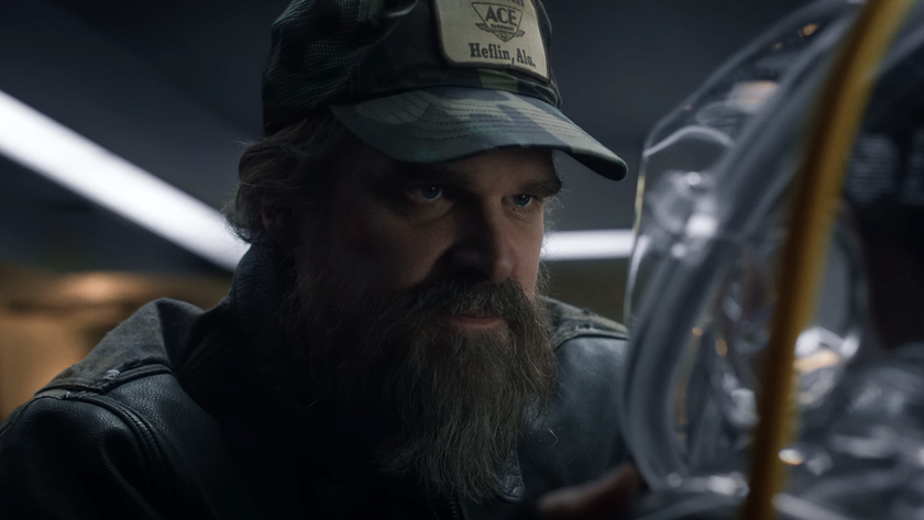 Hopper in Helfin cap talking to Eleven in Stranger Things Season 5