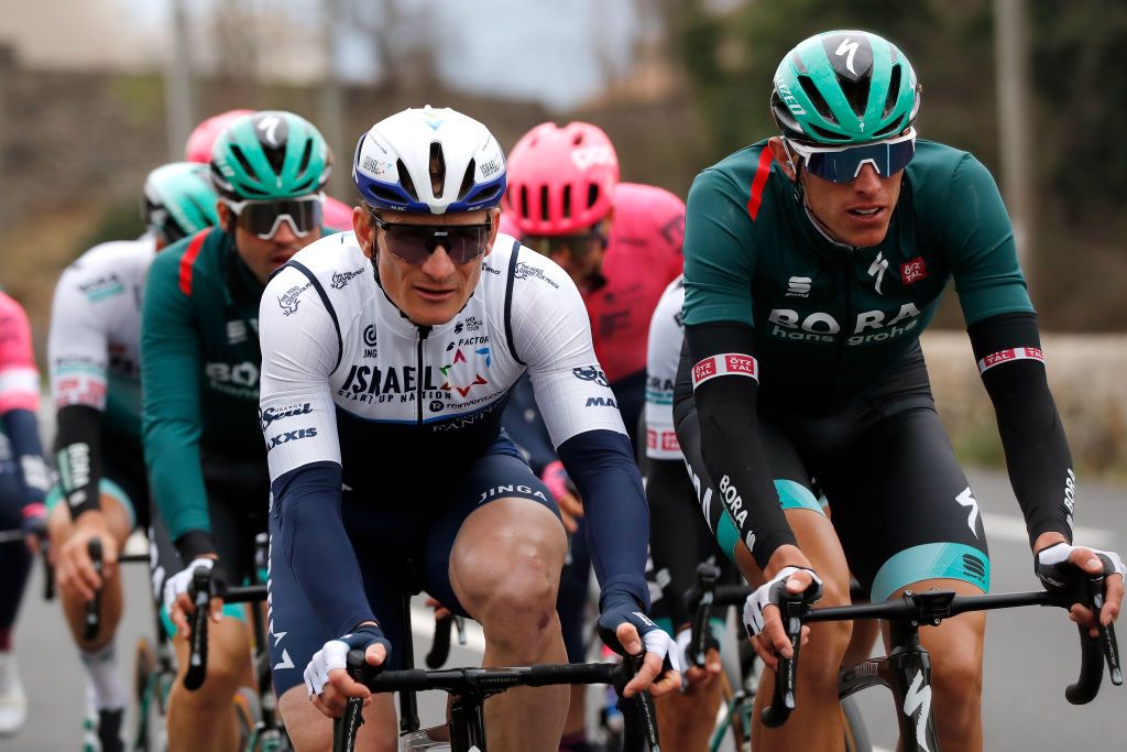 BOLLNE FRANCE MARCH 11 Andre Greipel of Germany and Team Israel StartUp Nation Nils Politt of Germany and Team Bora Hansgrohe during the 79th Paris Nice 2021 Stage 5 a 200km stage from Vienne to Bollne ParisNice on March 11 2021 in Bollne France Photo by Bas CzerwinskiGetty Images