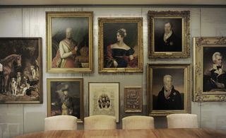 Old portraits framed in gold on the wall