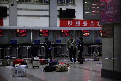 Knife-wielding men kill at least 28 people at Chinese train station