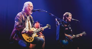 Randy Bachman and Burton Cummings perform onstage